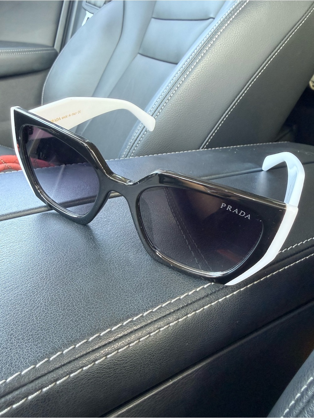 Prada Black Frame with White Temples Cat-Eye Sunglasses